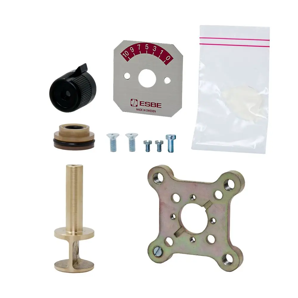 Reparaturset von ESBE mit verschiedenen Komponenten, darunter ein Drehknopf, Dichtungen, Schrauben, eine Halterung und eine Skala. Ideal für den Einsatz in bestimmten Ventilserien.